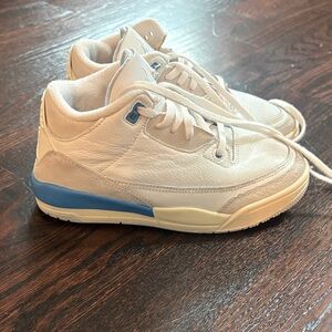 White and Light Blue Jordan 4 Retro Leather Sneaker